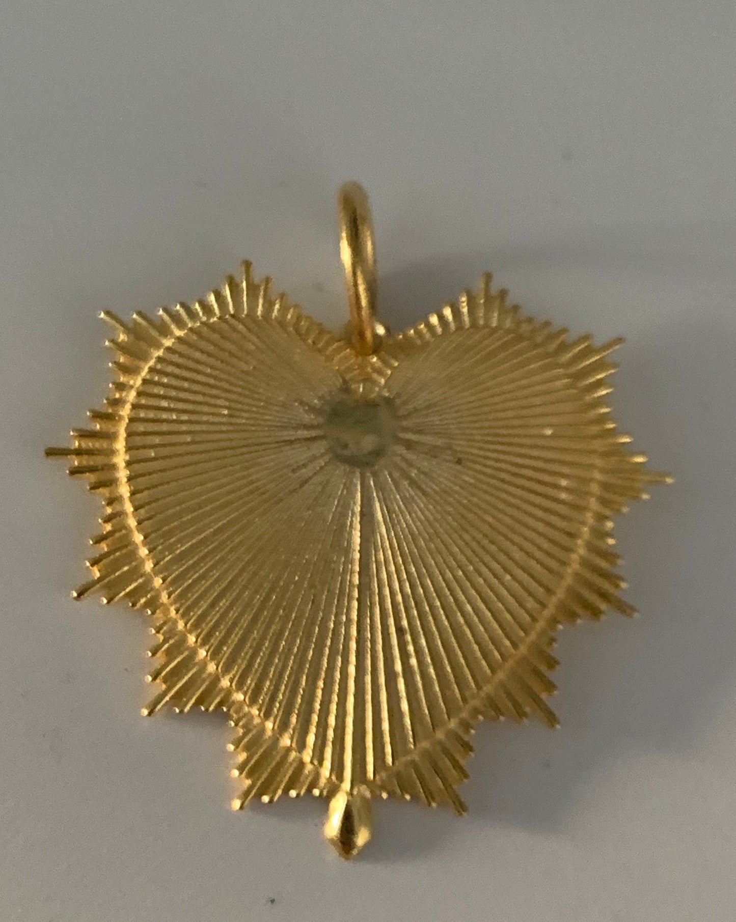 One micron gold plating over sterling silver charm