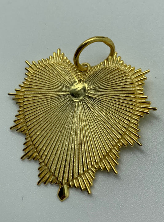 One micron gold plating over sterling silver charm