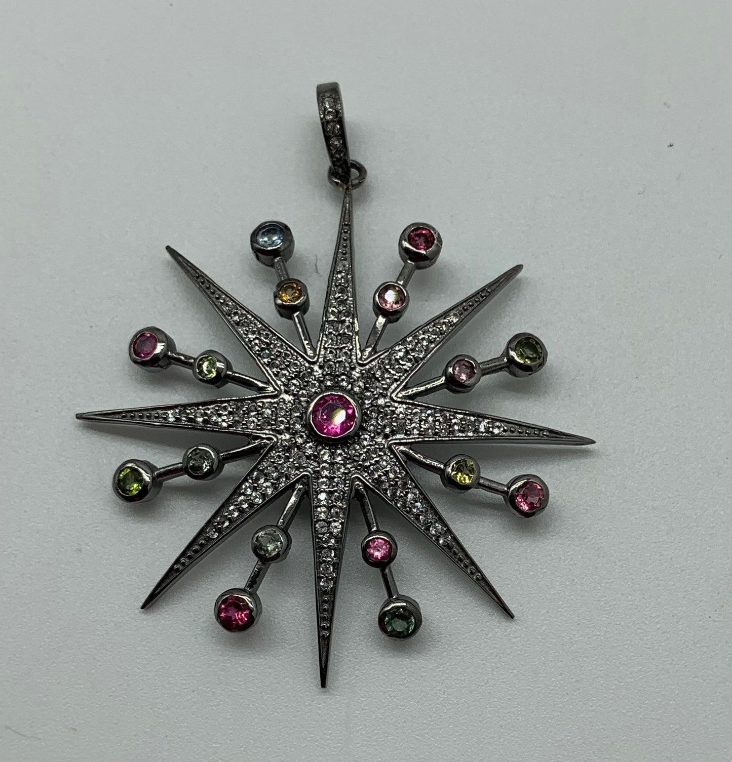 Tourmaline white topaz sterling silver starburst pendant