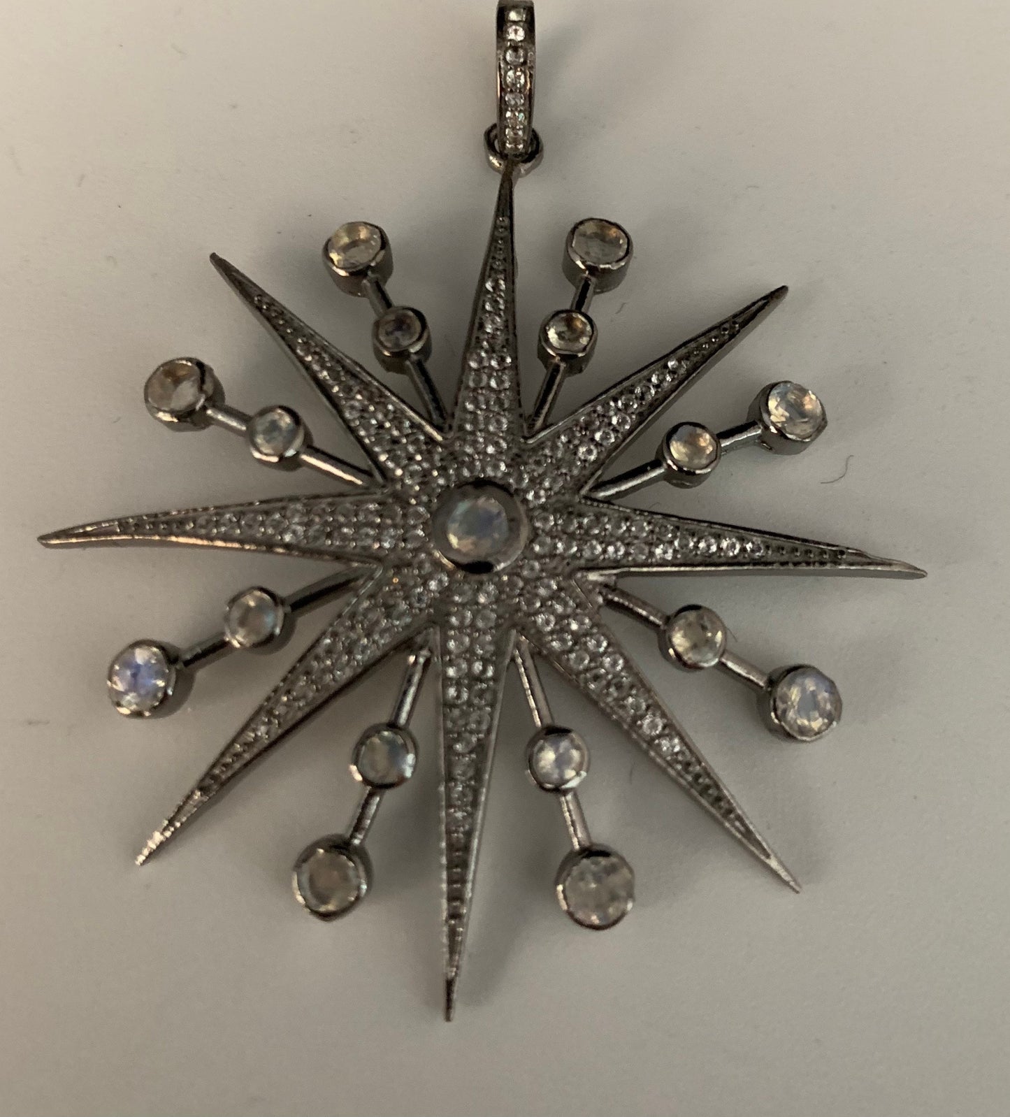 Moonstone white topaz sterling silver starburst pendant