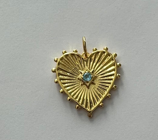 white topaz charm